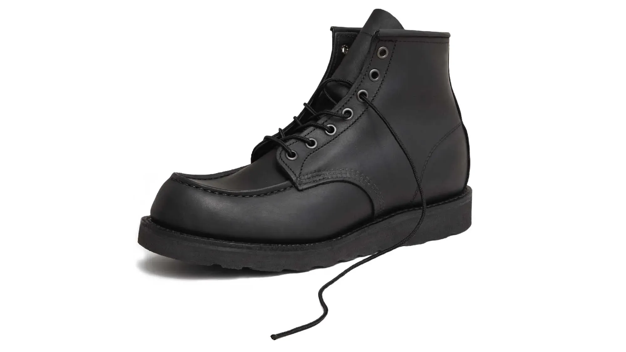 A black waxed suede moc toe boot on a black lug sole, with its laces undone