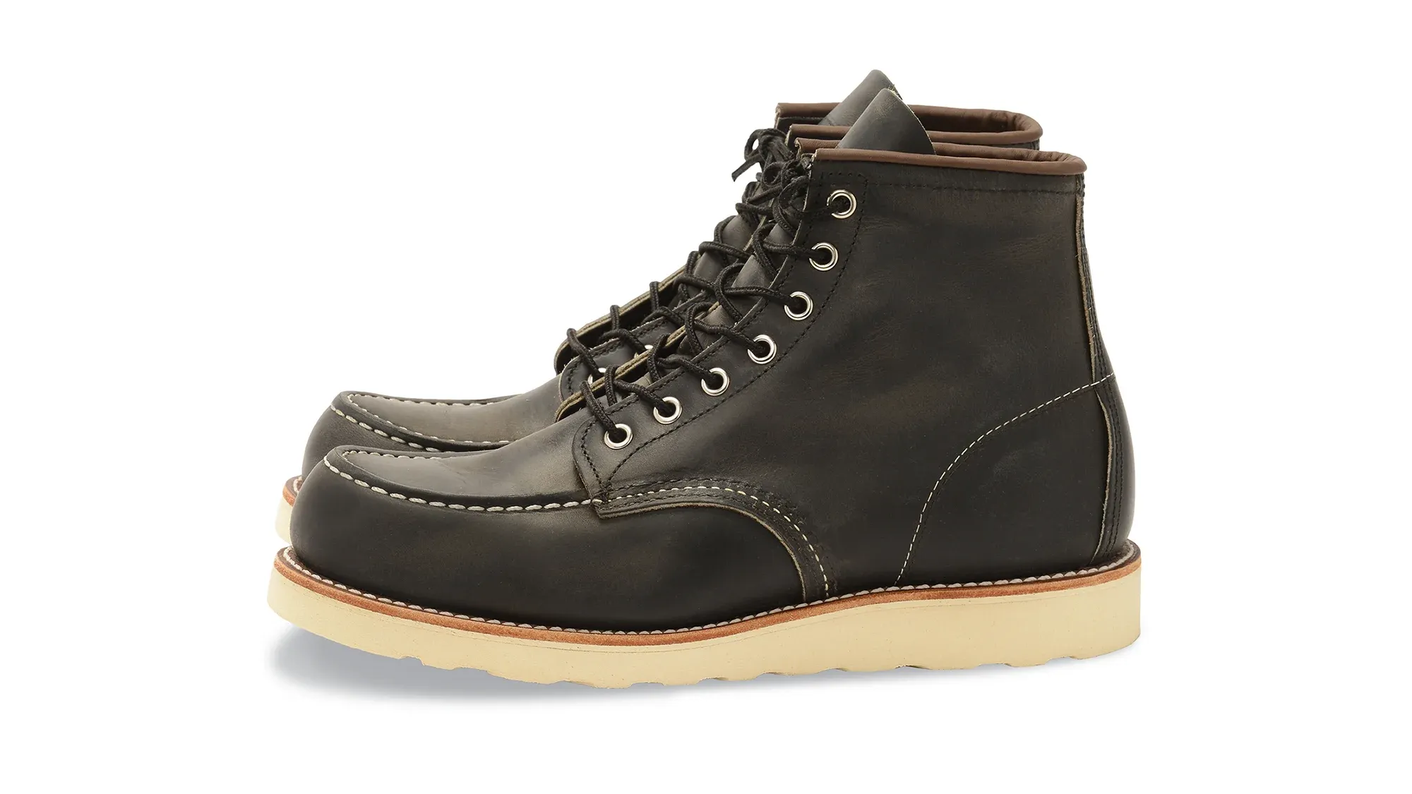 Charcoal grey leather moc toe boot with grey laces and a cream wedge sole